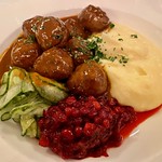Swedish meatballs with mashed potatoes, lingonberries, cucumber salad at Prinsen in Stockholm