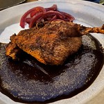 crispy duck mole with lime crema, pickled onions at A Ti in Echo Park