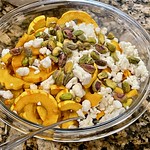 Roasted delicata squash with goat cheese and pistachios